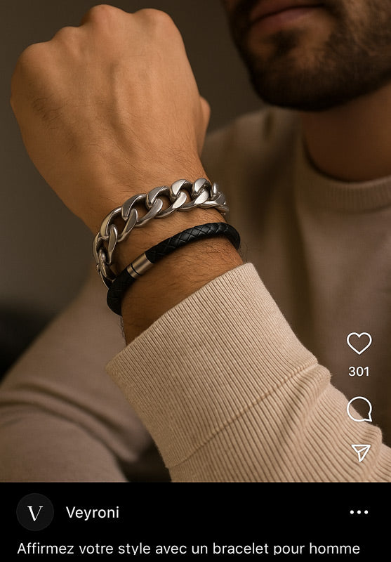 Bracelets en inox et en cuir au poignet d'un homme